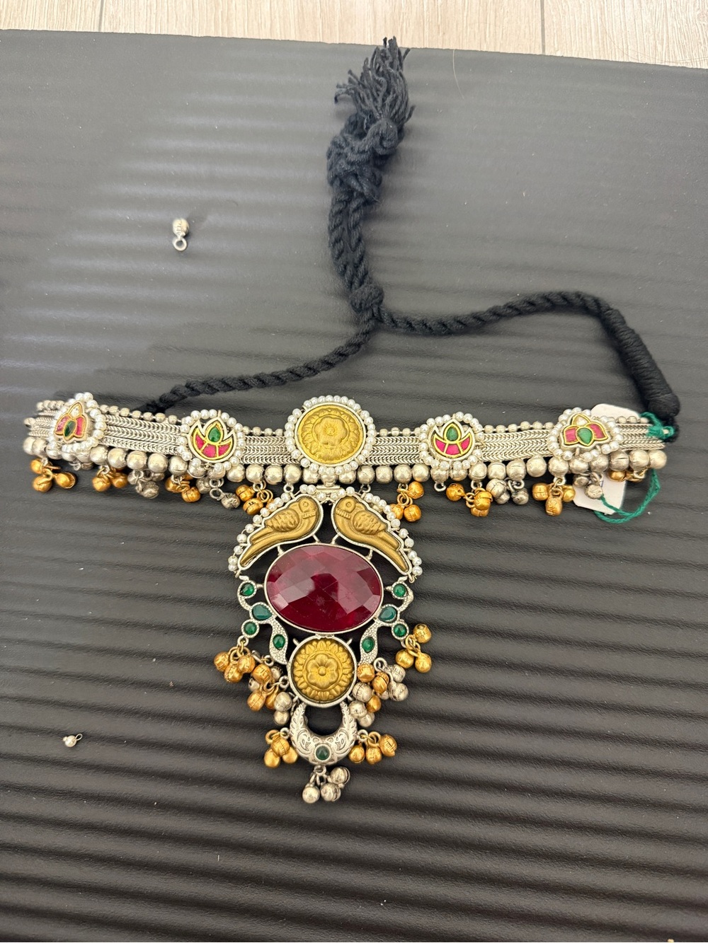 Handcrafted Silver-Tone Necklace with Deep Red Gem and Gold Accents